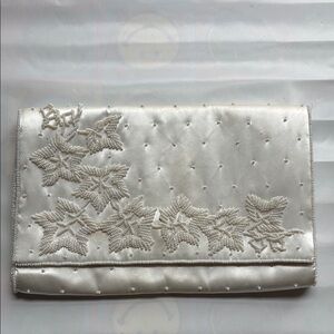 Embellished clutch with white beads